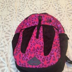 The North Face Pink and Black Leopard Backpack